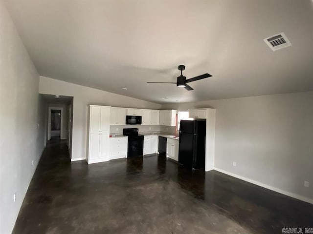 kitchen featuring white cabinetry, ceiling fan, black appliances, and vaulted ceiling