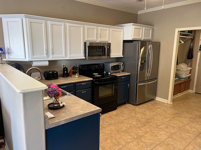 kitchen with crown molding, white cabinetry, stainless steel appliances, and light tile patterned floors