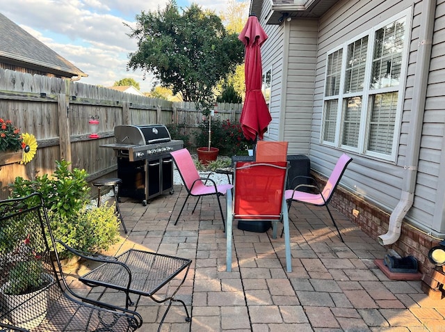 view of patio / terrace featuring a grill