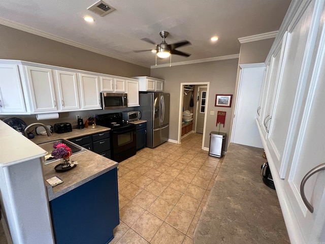 kitchen featuring appliances with stainless steel finishes, sink, ceiling fan, white cabinets, and ornamental molding