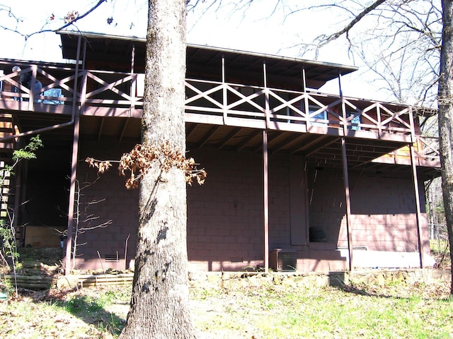 rear view of property with a deck