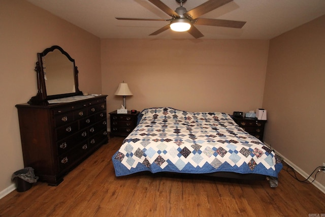 bedroom featuring ceiling fan and wood-type flooring