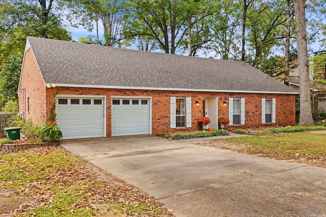 single story home with a garage