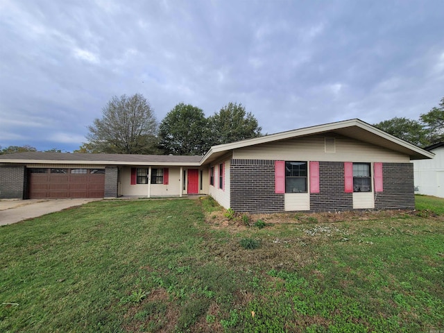 ranch-style house with a front lawn and a garage