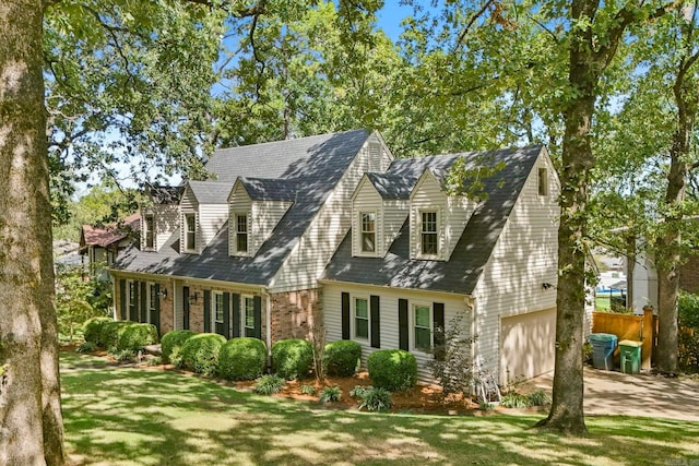 exterior space featuring a front yard and a garage