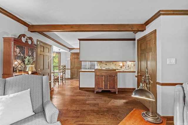 interior space featuring crown molding, beamed ceiling, dark wood-type flooring, and sink