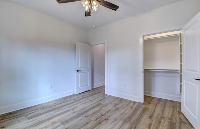 unfurnished bedroom with light wood-type flooring, a closet, and ceiling fan