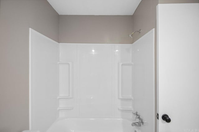 bathroom with shower / bath combination