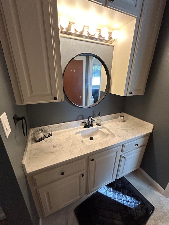 bathroom with vanity and tile patterned floors