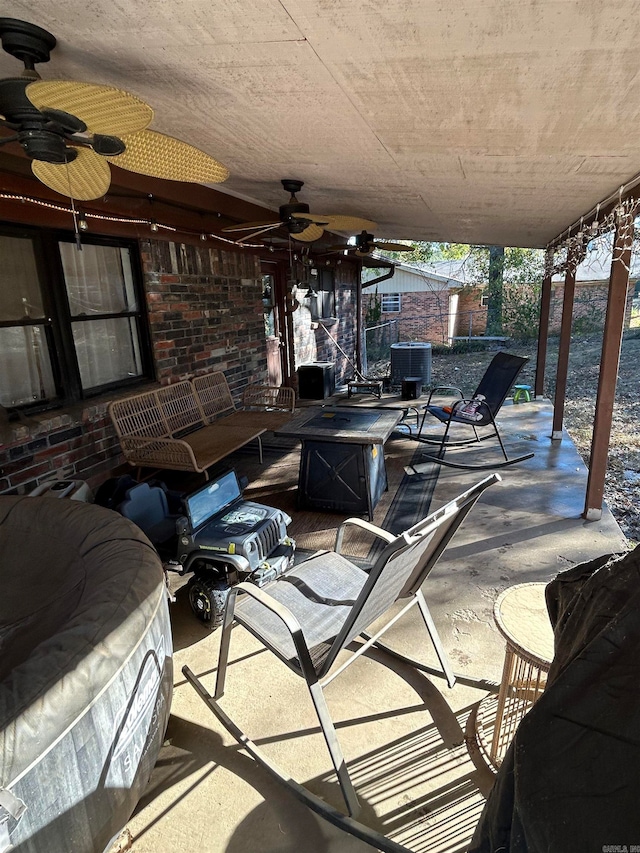 view of patio / terrace featuring ceiling fan