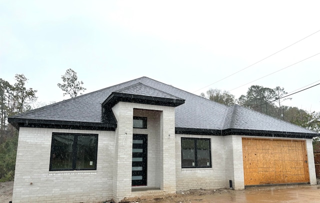 view of front of home featuring a garage