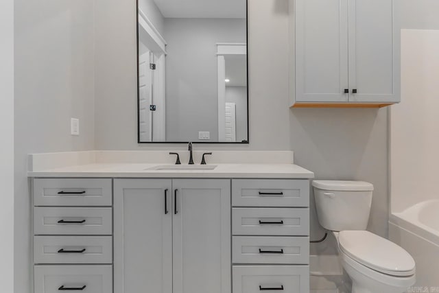 full bathroom featuring vanity, toilet, and bathtub / shower combination