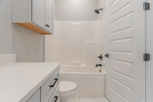 full bathroom with vanity, toilet, and  shower combination