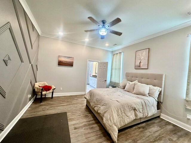 bedroom with ceiling fan, wood-type flooring, and crown molding