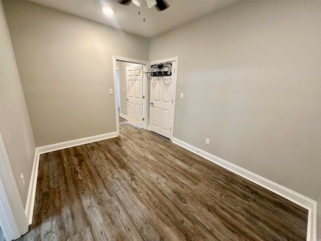 spare room with wood-type flooring and ceiling fan