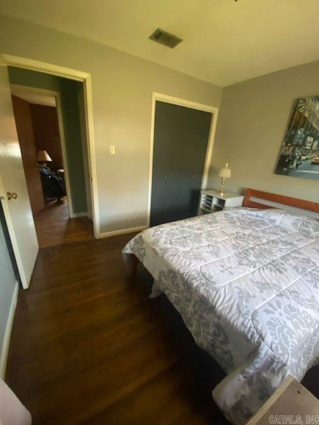 bedroom featuring hardwood / wood-style floors