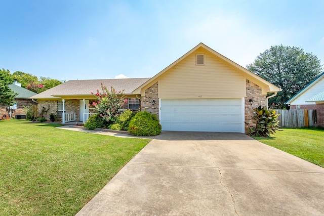 ranch-style house with a front lawn and a garage