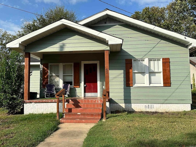 bungalow-style house featuring a front yard and a porch