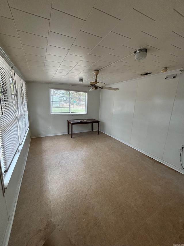 spare room with ceiling fan