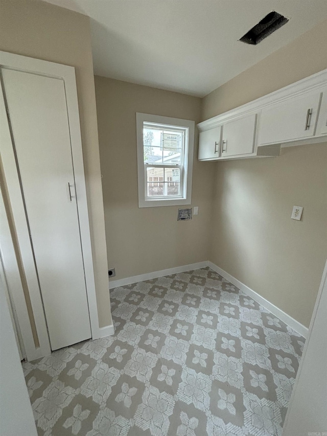2205 W 34th Ave, Pine Bluff, AR 71603 - laundry room with baseboards