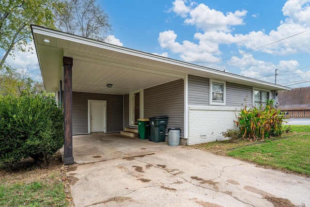 view of property exterior with a carport