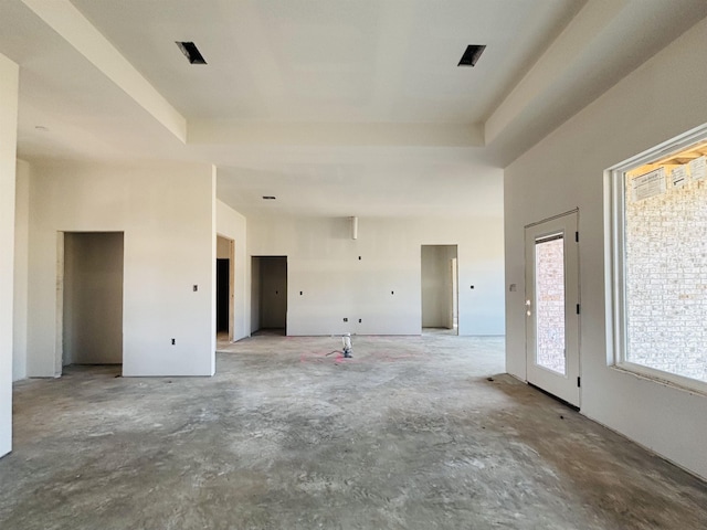 empty room with a tray ceiling