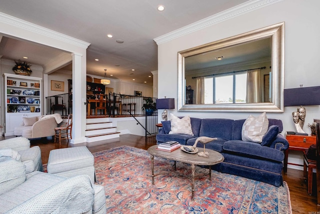 living room with dark hardwood / wood-style floors and crown molding