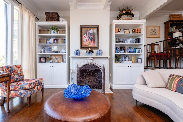 living room with dark hardwood / wood-style floors and crown molding