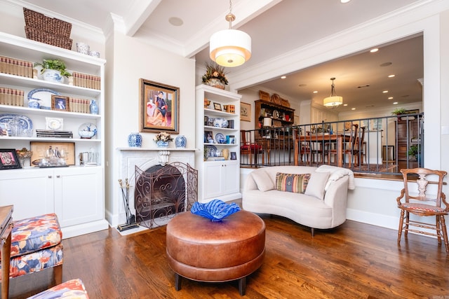 living room with dark wood-type flooring and crown molding