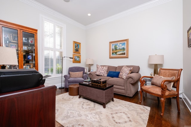 living room featuring dark hardwood / wood-style floors and crown molding