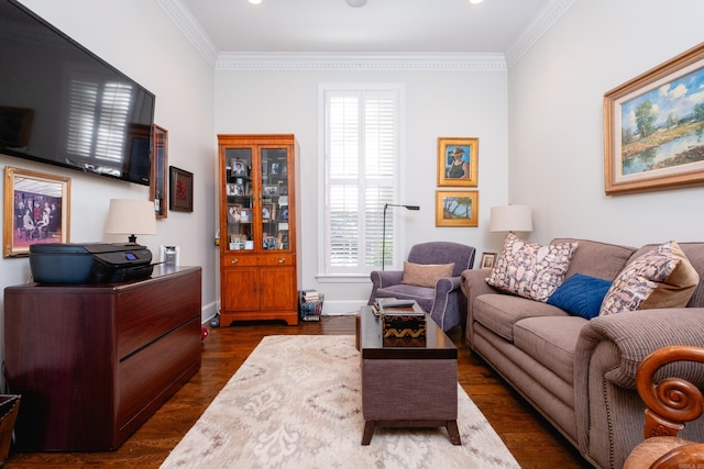 living room with dark wood-type flooring and crown molding