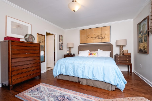 bedroom with dark hardwood / wood-style flooring and ornamental molding