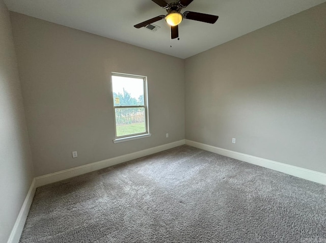 carpeted empty room with ceiling fan