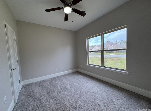 carpeted empty room with ceiling fan