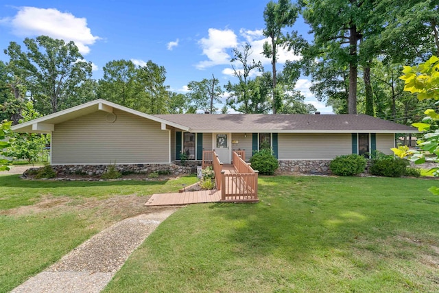 ranch-style house with a front lawn