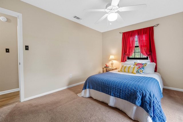 carpeted bedroom with ceiling fan