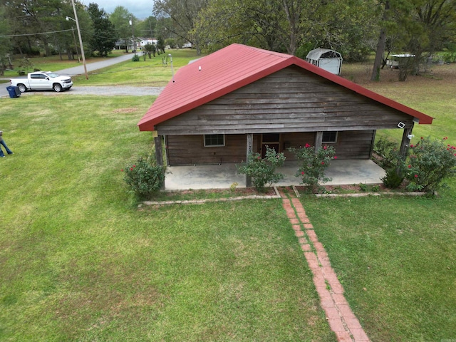 view of home's exterior featuring a lawn