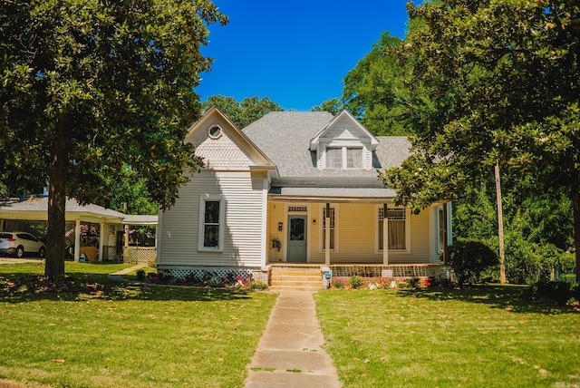 view of front facade featuring a front yard and a porch