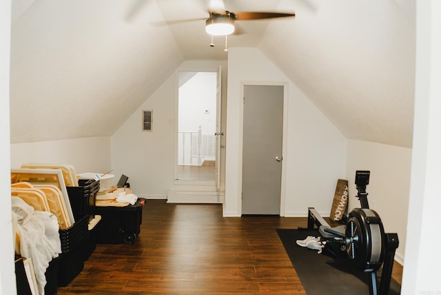 additional living space with ceiling fan, vaulted ceiling, and dark hardwood / wood-style floors