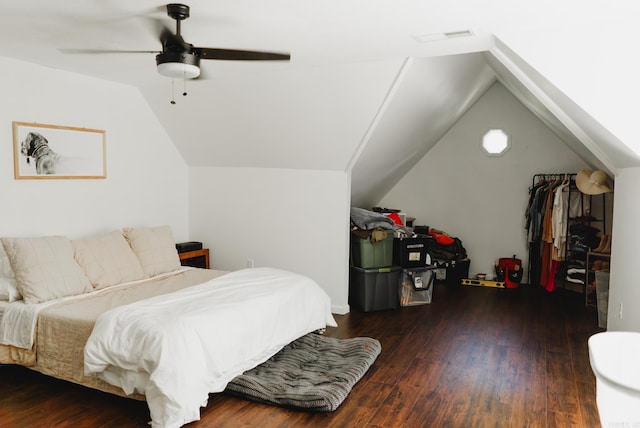 bedroom featuring dark wood-type flooring, ceiling fan, and lofted ceiling