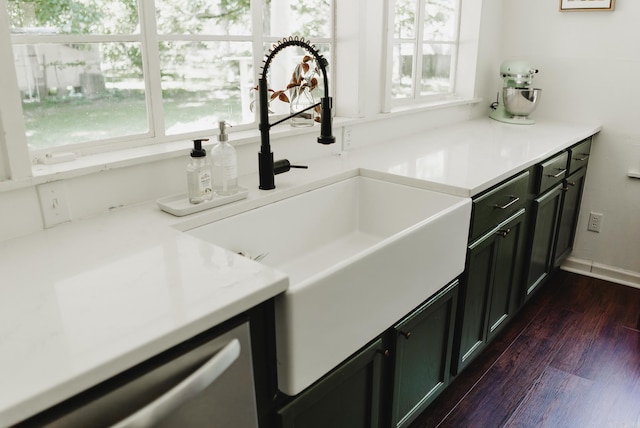 interior space with vanity, hardwood / wood-style flooring, and a healthy amount of sunlight