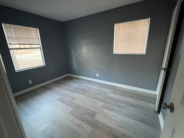 empty room with light wood-type flooring