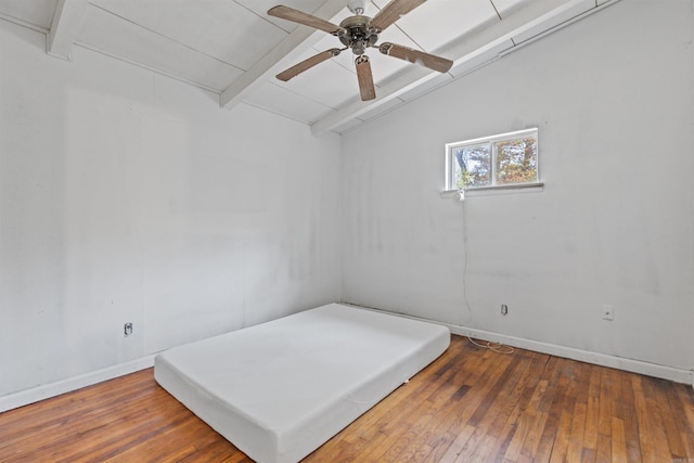 bedroom with dark hardwood / wood-style flooring, lofted ceiling, and ceiling fan