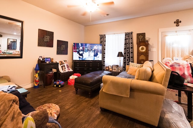 living room with ceiling fan and dark hardwood / wood-style floors