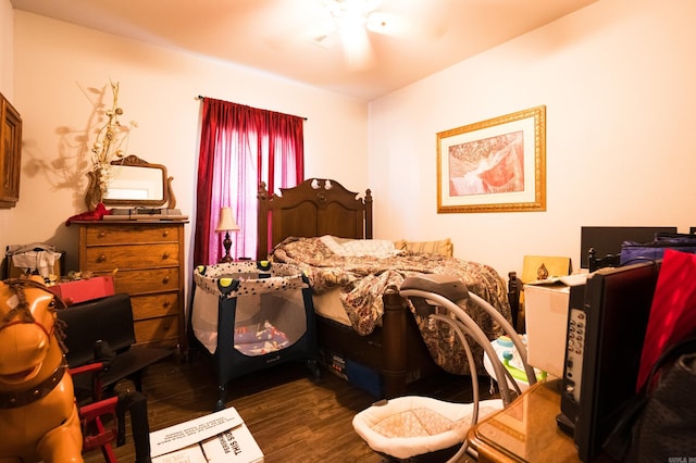 bedroom with dark wood-type flooring