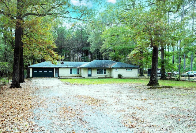 ranch-style home with a garage