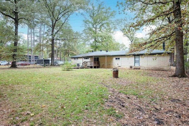 view of yard with a deck