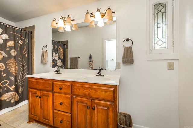 bathroom with vanity, a shower with shower curtain, and tile patterned floors