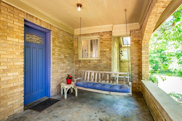 doorway to property featuring a porch