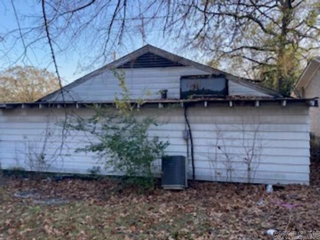 view of side of property featuring cooling unit